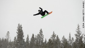 Snowboarders turn windsurfers in Breckenridge.