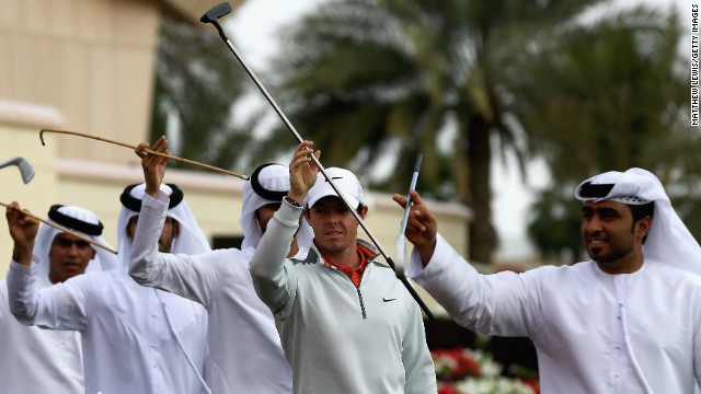 Rory McIlrory says he is feeling more relaxed ahead of the 2014 golf season and it shows as he joins in some local dancing ahead of the Abu Dhabi Golf Championship.