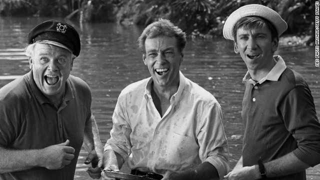 Alan Hale Jr., Russell Johnson and Bob Denver stand knee-deep in water in a 1966 episode of 