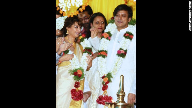 Tharoor, right, and his bride, left, take part in their wedding ceremony in the town of Palakad, India, on August 22, 2010. 