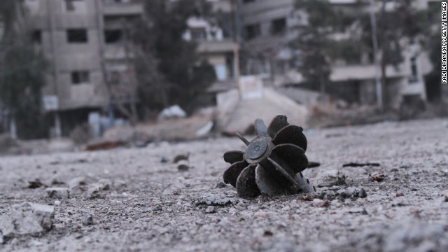 A piece of exploded mortar lies in a street in Daraya, a city southwest of Damascus, on Friday, January 17.