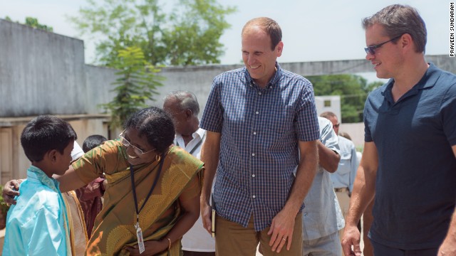 White, left, and Damon visit students and teachers at BWDA Middle School in Kolliyangunam, a village near Chennai, India. Hygiene education programs at this school have reduced the number of sick days for students and encouraged families to improve their sanitation facilities.