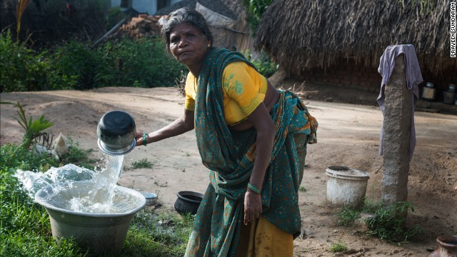 A woman in Vilupuram, India, washes pots and pans at her new water point. With safe water at her home, she no longer has to make daily trips to the river. Matt Damon and Gary White co-founded <a href='http://water.org/' target='_blank'>Water.org</a>, a nonprofit that helps communities achieve sustainable water systems. Click through to see the work they are doing throughout the world: 