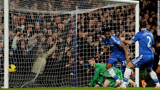 Samuel Eto'o (center) celebrates with Branislav Ivanovic after completing his hat trick for Chelsea against Manchester United