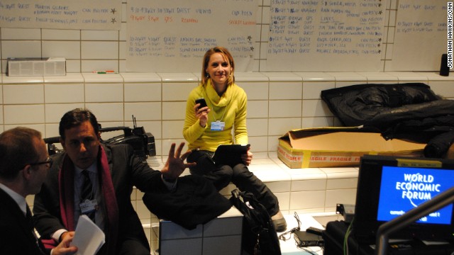 Nina dos Santos finding that space is at a premium in CNN's Davos workspace.