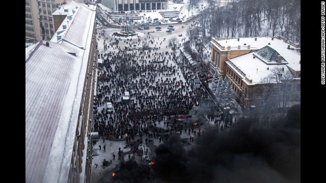 Ukrainian police storm protesters' barricades in Kiev amid violent clashes on January 22.