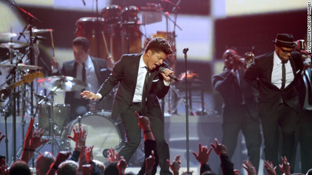 A few days before appearing in court <a href='http://www.cnn.com/2011/SHOWBIZ/celebrity.news.gossip/02/16/bruno.mars.plea/' >to accept a plea deal on a drug charge</a>, singer Bruno Mars performed at the 2011 Grammy Awards and won a Grammy for best male pop vocal performance. 