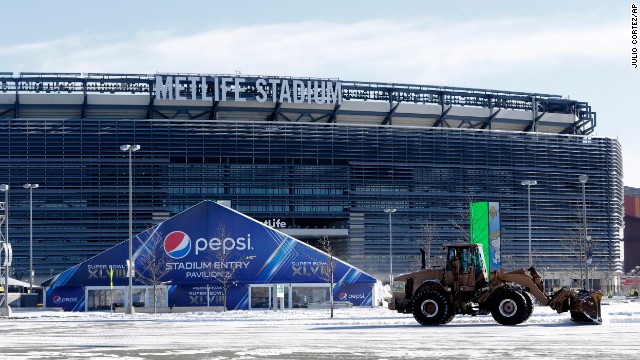 A tractor plows snow at MetLife Stadium on Wednesday, January 22.