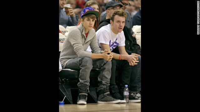 Even as he's become astronomically famous, Bieber hasn't lost touch with his Canadian childhood friends. Ryan Butler (pictured right in 2011) is a familiar face to Beliebers both on and off the red carpet, and he considers Bieber a brother. On Twitter, you'll often catch him offering Bieber supportive tweets like this one. 