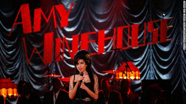 Amy Winehouse had to perform via satellite at the Grammys in 2008 after initially being denied a visa to travel to the U.S. because of issues related to drug abuse. The decision was ultimately reversed, but not in enough time for her to make the show. <a href='http://www.youtube.com/watch?v=1CSX8DxYUJk' >Cameras caught her stunned reaction during the show </a>when she learned her single "Rehab" had won record of the year. 