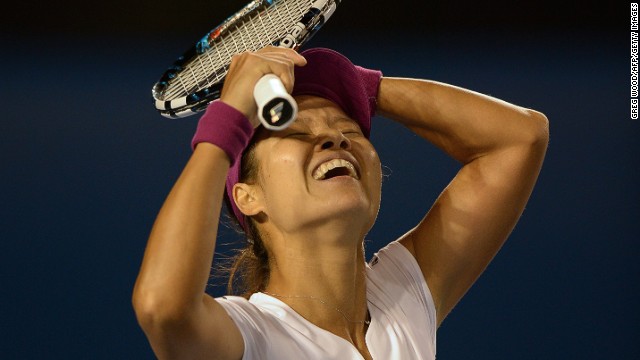 Li Na savors the moment of victory. The fourth seed in Melbourne overcame Slovakia's Dominika Cibulkova in straight sets 7-6 (7-3) 6-0 to win her first Australian Open title. 