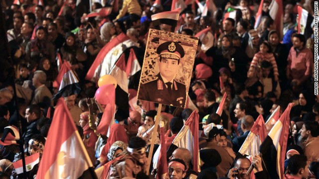 Supporters of Abdel-Fattah el-Sisi, Egypt's minister of defense, gather at Tahrir Square to mark the anniversary. 