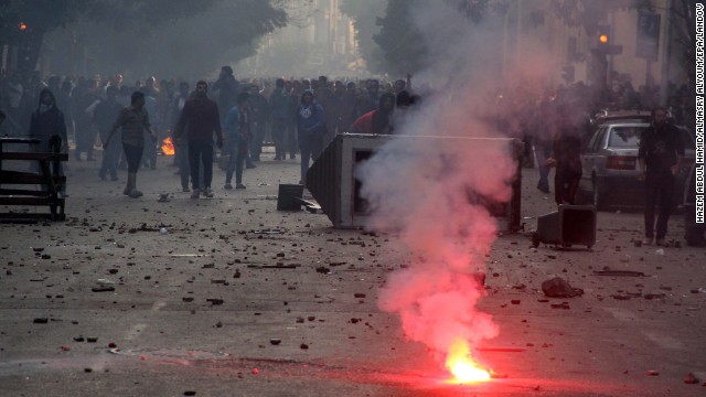 Supporters of the Muslim Brotherhood clash with security forces in Cairo.