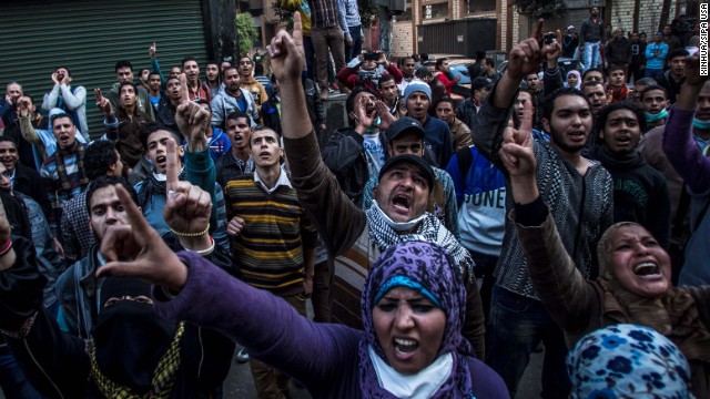 Anti-military protesters shout slogans near the Ramses Square in downtown Cairo.