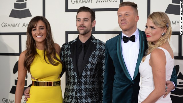 Macklemore, second from right, and Ryan Lewis with their guests