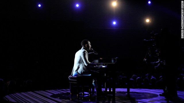 John Legend takes center stage to perform his ballad "All of Me."