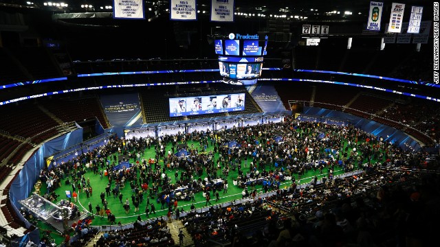 People attend Super Bowl XLVIII media day at the Prudential Center in Newark, New Jersey, on Tuesday, January 28.