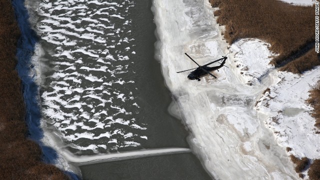 A Black Hawk helicopter flies near MetLife Stadium on January 28. Customs and Border Protection agents are helping to secure the area for the Super Bowl.