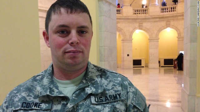 Everyone sees the President, the VIPs, the robes and the brass. But CNN went in search of the unseen guests, the everyday Americans in the balconies for the State of the Union speech. Members of Congress can invite one guest each. These are some of the people they chose. We lead with Matt Cooke. During the 2009 mass shooting at Fort Hood, Cooke threw himself between attacker Nidal Hasan and a fellow soldier and was shot five times himself. A shy man who works to prevent military suicides, he struggles with post-traumatic stress disorder and sat near a House chamber door during the State of the Union in case of a panic attack. He said he attended the speech to fight for Fort Hood families and their push that the 2009 attack be considered a terrorist act.