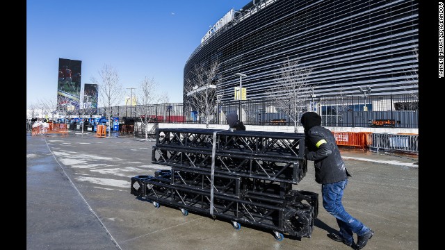 A man moves equipment outside MetLife Stadium in East Rutherford on January 29. The stadium will host the game Sunday.