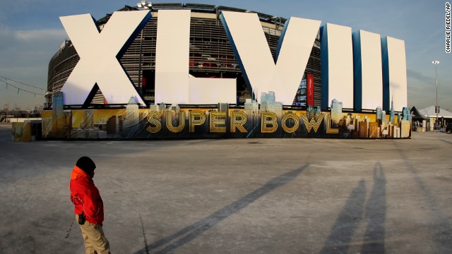 A security guard stands in front of MetLife Stadium Saturday, February 1, in East Rutherford, New Jersey, the site of Sunday's NFL championship game between the Denver Broncos and the Seattle Seahawks.