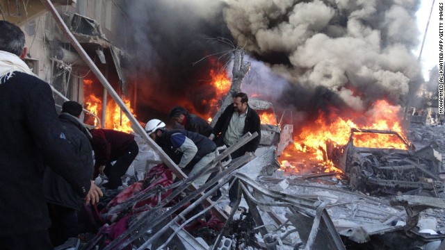 Medical personnel look for survivors after a reported airstrike in Aleppo, Syria, on Saturday, February 1.