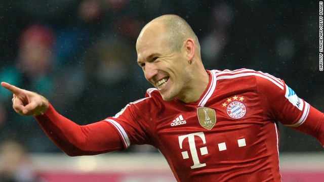 Arjen Robben celebrates after scoring Bayern Munich's third in the 5-0 rout of Eintracht Frankfurt at the Allianz Arena.