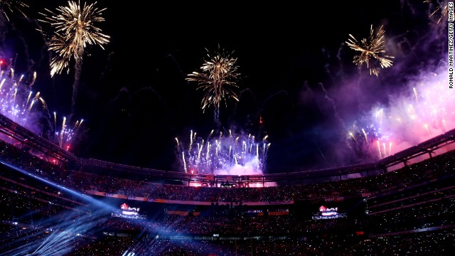 Fireworks go off over the stadium at the end of the halftime show. 