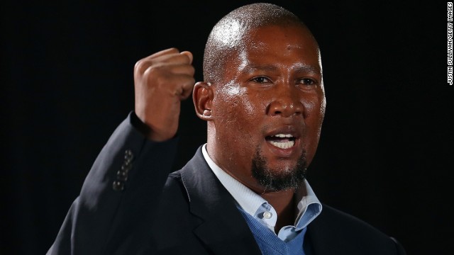 Mandla Mandela, the grandson of Nelson Mandela and eldest son of Makgatho, speaks during an African National Congress (ANC) led alliance send off ceremony at Waterkloof military airbase on December 14, 2013 in Pretoria, South Africa. Nelson Mandela left $300,000 of the NRM Family Trust to use for the benefit of Mandla, for the trustees to dole out in consultation with his father as deemed necessary (although his father is dead).