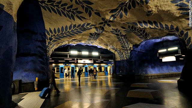 Stockholm's central station gets stranger the further you descend, until you reach the cave-like platform level, with its abstract floral designs. 