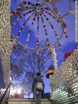 It's hard to stand out in a city as beautiful as Paris. The beaded Palais Royal -- Musée du Louvre metro entrance design from 2000 doesn't try to be meek.