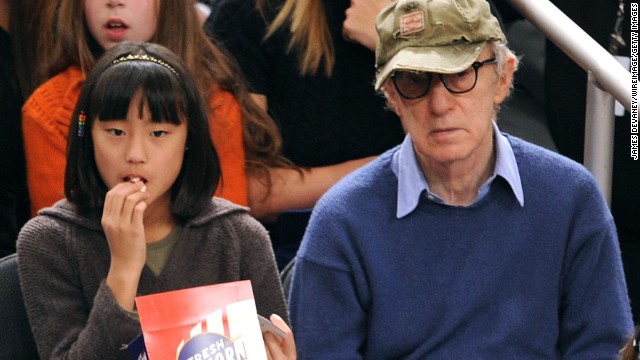 Woody Allen and adopted daughter Bechet Dumaine Allen attend a basketball game in 2009 at Madison Square Garden in New York. Her mother is Allen's current wife, Soon-Yi Previn.