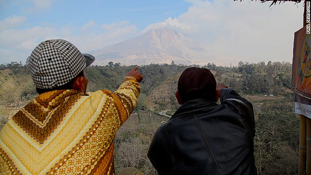 Locals have been coming on a daily basis to view the non-stop spectacle. These two men told us they felt the earth shake beneath them and the noise was like a "gigantic bomb" going off. 