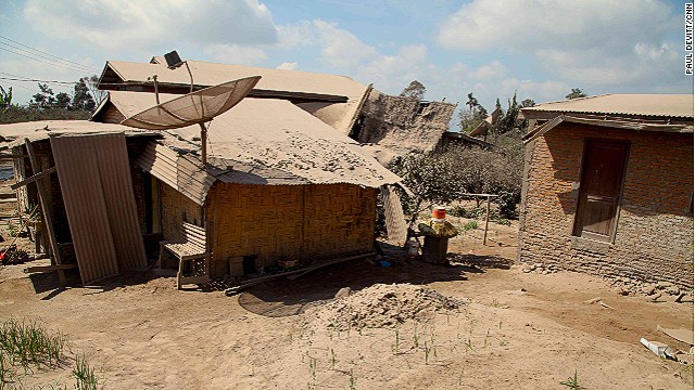 These villages have been covered in ash for months. When it rains, the ash turns to a thick coating of mud.