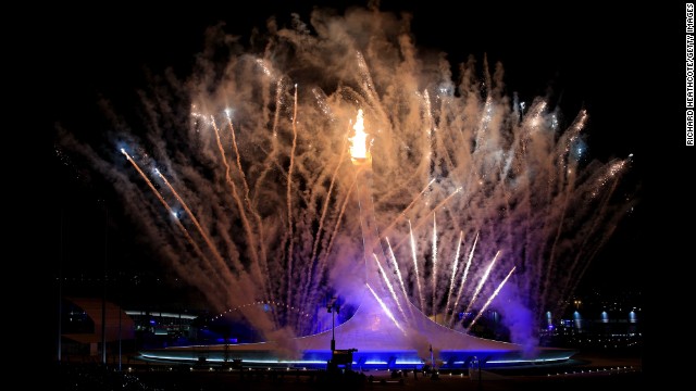 Fireworks explode over Fisht Olympic Stadium in Sochi, Russia, as the Olympic cauldron is lit during the opening ceremony of the 2014 Winter Games on Friday, February 7.