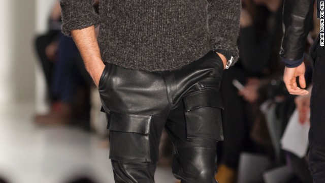 A model walks down the runway in leather pants for Nautica.