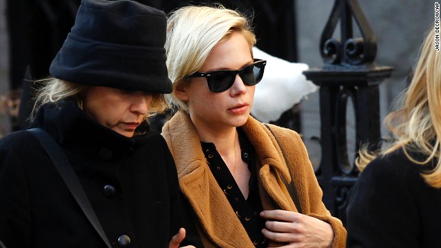 Actress Michelle Williams, wearing glasses, worked with Hoffman in "Synecdoche, New York."