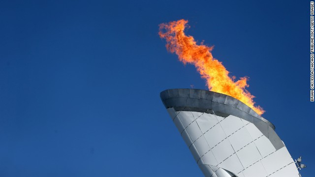 The Olympic flame burns.