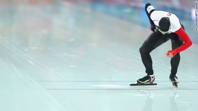 Mathieu Giroux of Canada prepares to compete during the men's 5,000-meter speedskating event.