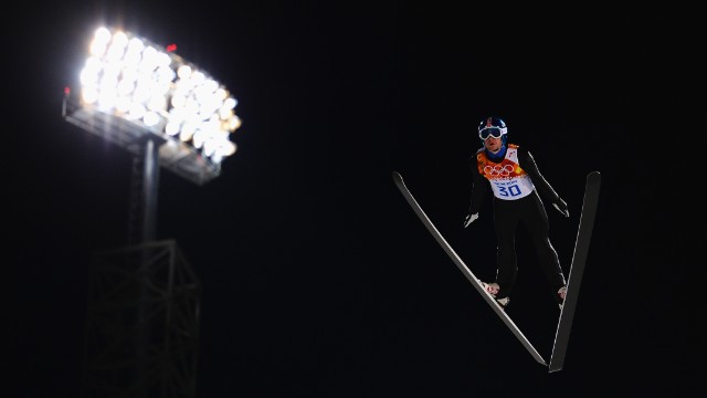 Anders Jacobsen of Norway jumps during qualification for the men's normal hill ski jumping event.