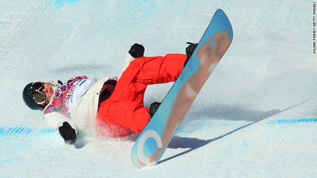 Snowboarder Lucien Koch of Switzerland falls during the men's slopestyle semifinals on February 9. 