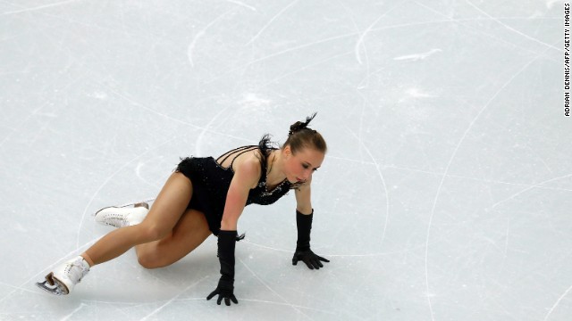 Germany's Nathalie Weinzierl takes a fall during the team figure skating event.