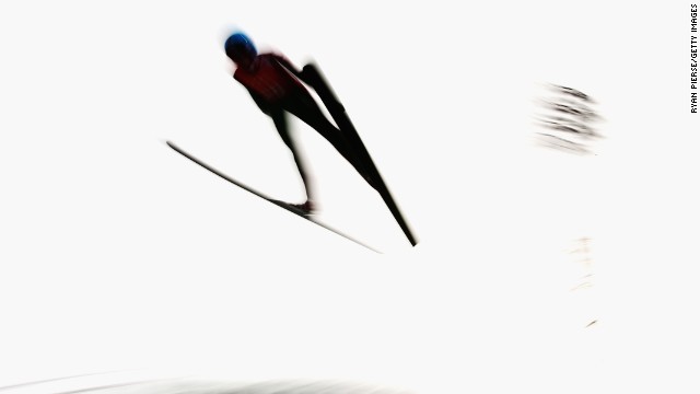 Helena Olsson Smeby of Norway jumps February 9 during training for the women's normal hill ski jumping event.