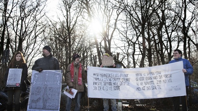Protestors demonstrate outside the Copenhagen Zoo against the killing of the giraffe on February 9. 