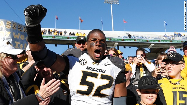 Sam celebrates with fans after the Mizzou defeated the Kentucky Wildcats at Commonwealth Stadium on November 9 in Lexington, Kentucky.