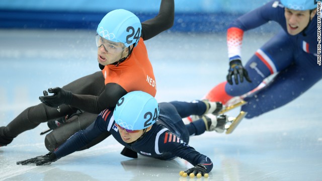 Dutch speedskater Sjinkie Knegt, left clashes with South Korea's Park Se Yeong in the men's 1,500-meter short track race.