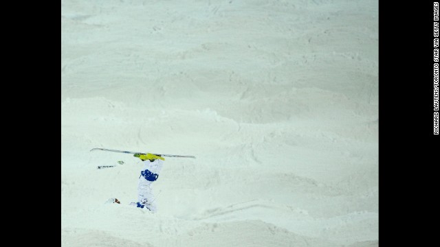 Russia's Sergey Volkov tumbles during the men's moguls.
