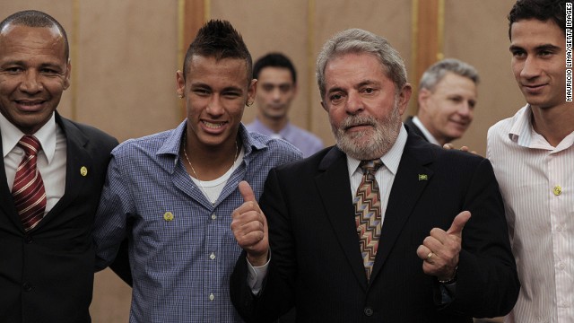 Neymar Senior, pictured on the left, represents his son, seen here alongside former Brazil President Luiz Inacio Lula da Silva as well as his onetime playing partner at Santos, Paulo Henrique Ganso.