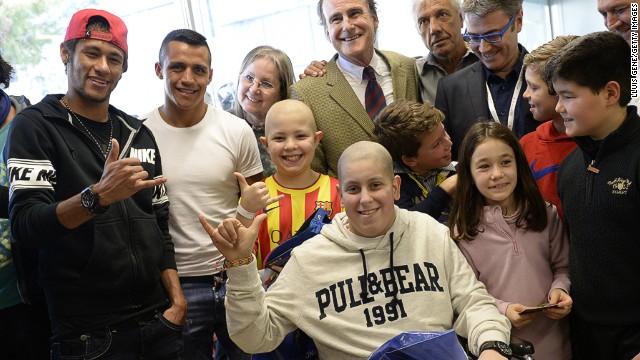 Barcelona is a club that has grown its off-field image to accompany its stunning on-field success, with the Spanish side having been crowned kings of Europe four times. Here, Neymar accompanies Alexis Sanchez during a charity visit to Barcelona's Hospital del Mar. 