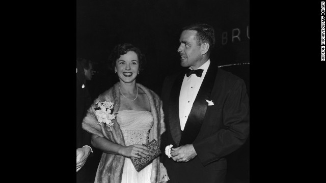 Temple and her second husband, Charles Black, arrive at the premiere of "Roman Holiday" in 1953.